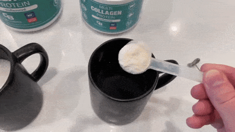 Collagen powder dissolving in mug of hot water